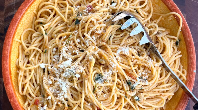 Seven simple, high-quality ingredients create the magically complex flavors in this pasta. (Kellie Hynes for The Atlanta Journal-Constitution)