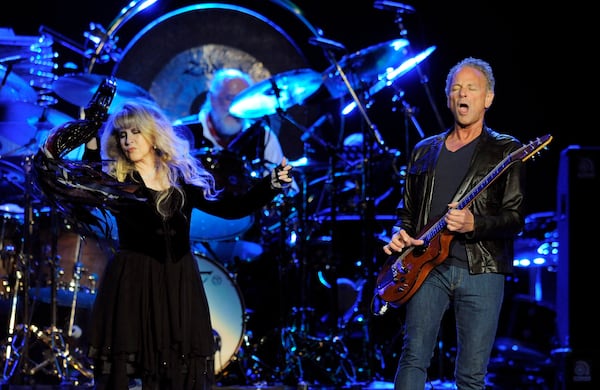 FILE - Stevie Nicks. left, and Lindsey Buckingham of Fleetwood Mac perform in Los Angeles on July 3, 2013 . (Photo by Chris Pizzello/Invision/AP, File)
