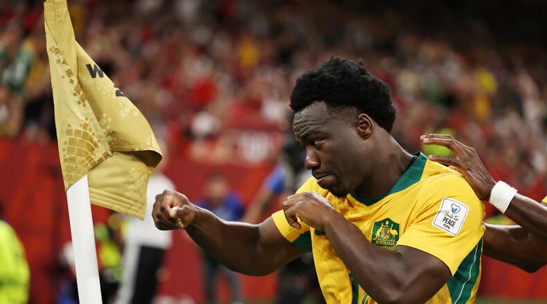 Australia's Nestory Irankunda (17) celebrates scoring the first goal against Turkey during the World Cup Group D soccer match, in Vancouver, British Columbia, Saturday, June 13, 2026. (AP Photo/Kaleb Tatum)