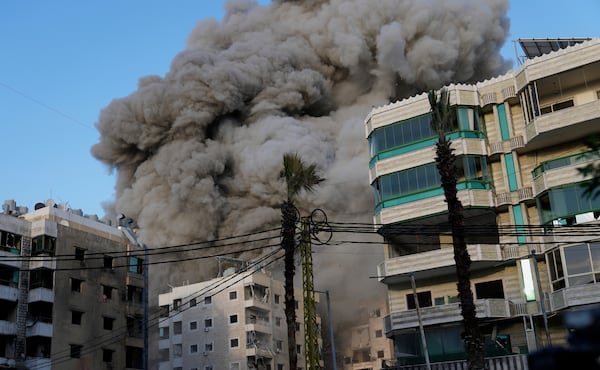 Smoke rises after an Israeli airstrike in Dahiyeh, the southern suburb of Beirut, Lebanon, Sunday, April 27, 2025. (AP Photo/Hussein Malla)