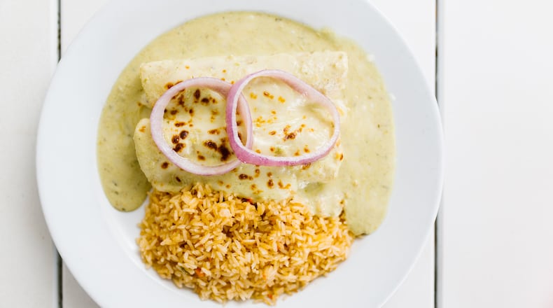 Taqueria del Sol’s Chicken Enchiladas Suizas. Courtesy of Feiten Photography