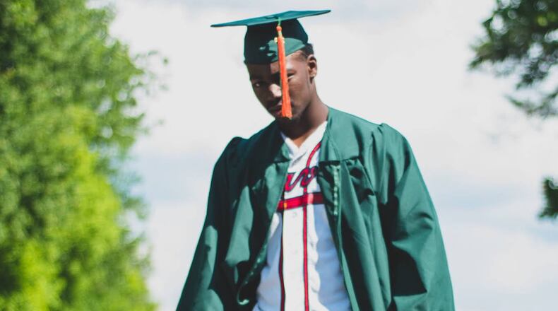 Even before baseball's draft, Michael Harris was wearing his favorite team's colors beneath the graduation gown. (Photo courtesy Harris family)