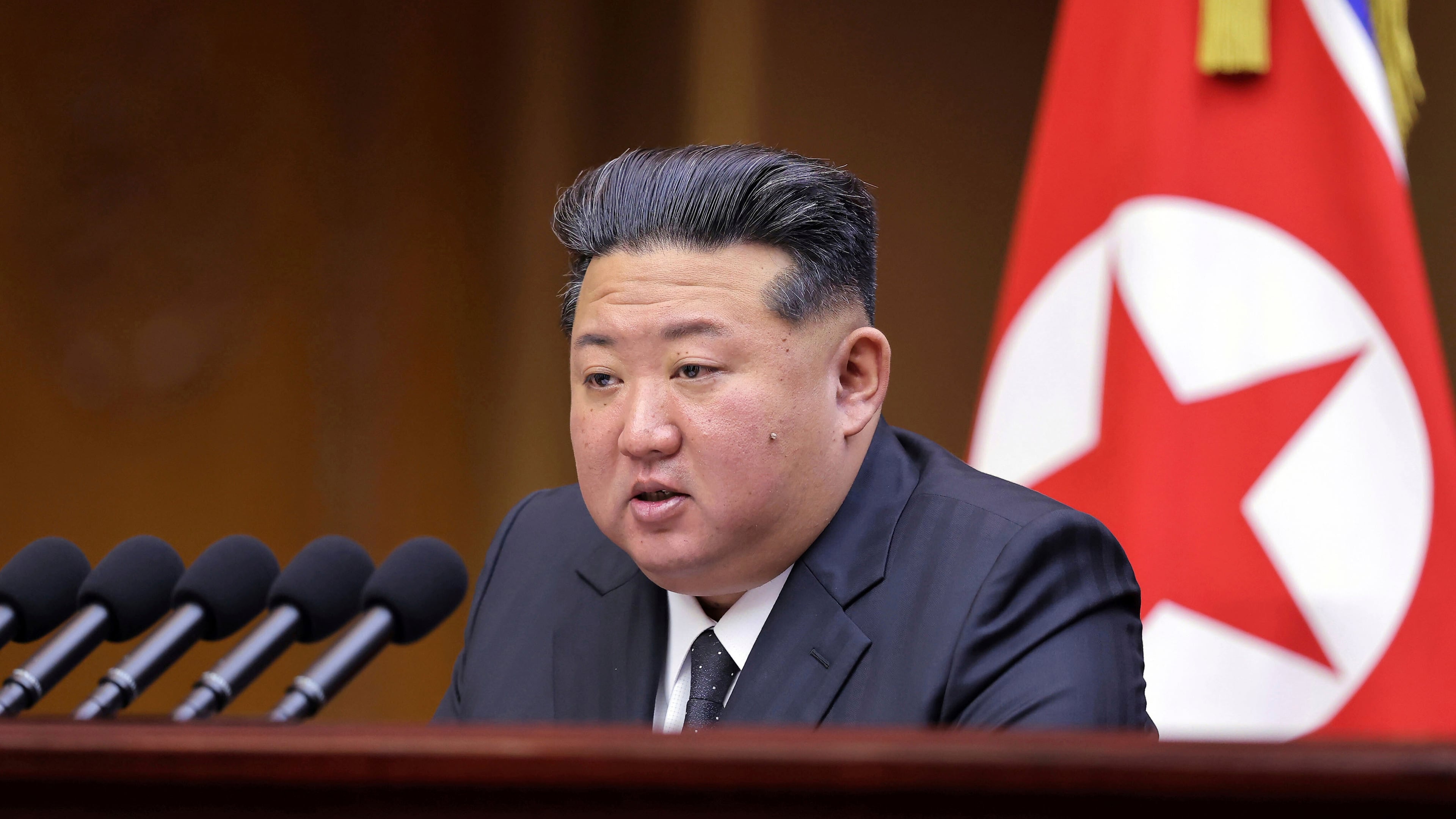 This photo provided by the North Korean government, shows North Korean leader Kim Jong Un speaks during a parliament session at the Supreme People’s Assembly, which was held on Sept. 20-21, 2025 in Pyongyang, North Korea. Independent journalists were not given access to cover the event depicted in this image distributed by the North Korean government. The content of this image is as provided and cannot be independently verified. Korean language watermark on image as provided by source reads: "KCNA" which is the abbreviation for Korean Central News Agency. (Korean Central News Agency/Korea News Service via AP)