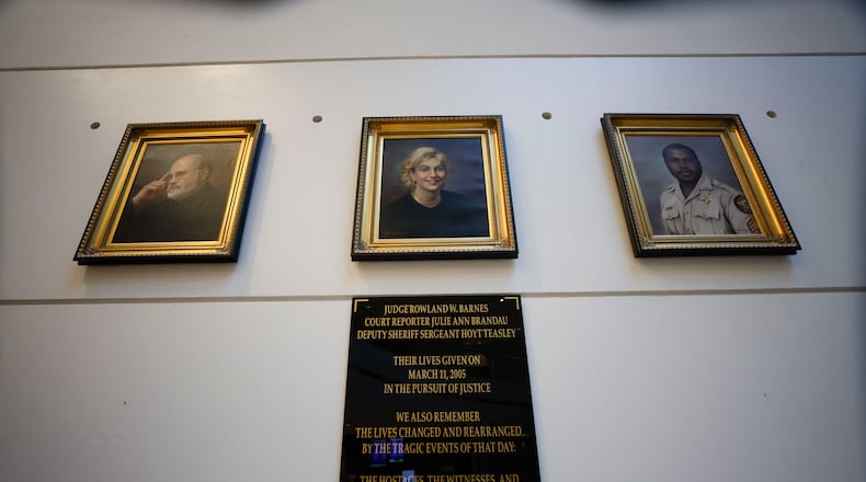 A memorial located on the first floor of the Fulton County Courthouse commemorates the victims: Judge Rowland Barnes, court reporter Julie Ann Brandau and Sheriff’s Deputy Sgt. Hoyt Teasley. This marks the 20th anniversary of their deaths, resulting from the actions of Bryan Nichols on March 11, 2005.
(Miguel Martinez/ AJC)