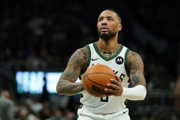 FILE - Milwaukee Bucks' Damian Lillard shoots a free throw during the second half of an NBA basketball game against the Orlando Magic, March 8, 2025, in Milwaukee. (AP Photo/Aaron Gash, File)