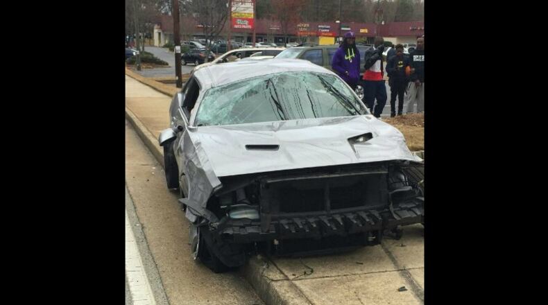 A car rolled four time when it crashed after a police chase Tuesday in Atlanta. (Credit: Channel 2 Action News)