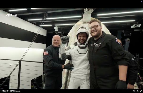 In this image made from video provided by SpaceX, one of the four astronauts, Hungary's Tibor Kapu, comes out of a SpaceX capsule loaded at the recovery ship after parachuting into the Pacific Ocean off the coast of Southern California on Tuesday, July 15, 2025. (SpaceX via AP)