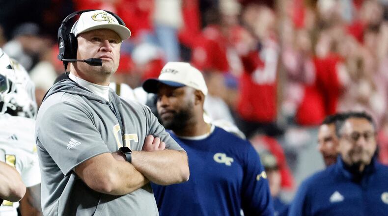 Georgia Tech head coach Brent Key looks at a replay against North Carolina State during the first half of an NCAA college football game in Raleigh, N.C., Saturday, Nov. 1, 2025. (AP Photo/Karl DeBlaker)