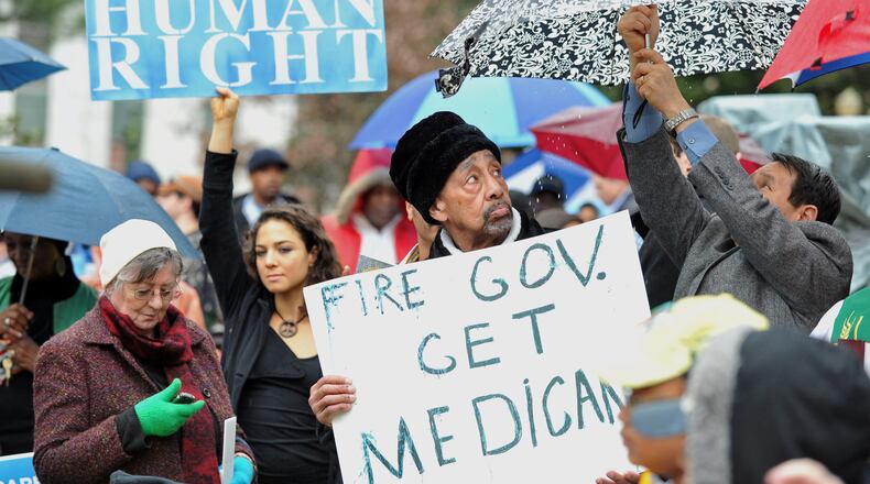 January 13, 2014 Atlanta: About 200 people attended the Moral Monday rally at the state Capitol, calling on Gov. Nathan Deal to expand Georgia's Medicaid program Monday January 13, 2014. BRANT SANDERLIN /BSANDERLIN@AJC.COM A Moral Monday gathering in 2014 at the state Capitol. Brant Sanderlin, bsanderlin@ajc.com