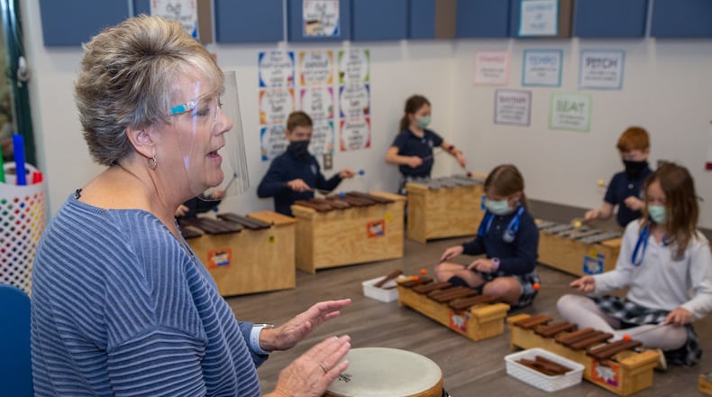 Mrs. Laurie Plate leads her music class at Cornerstone Christian Academy in Peachtree Corners on Monday January 25th, 2021 For a story on the Top Workplace small category. PHIL SKINNER FOR THE ATLANTA JOURNAL-CONSTITUTION.