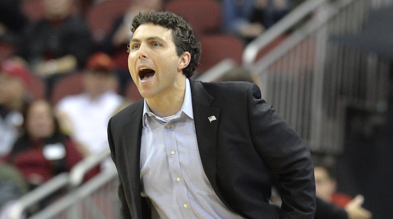 Georgia Tech coach Josh Pastner shouts instructions to his team during the first half of an NCAA college basketball game against Louisville, Thursday, Feb. 8, 2018, in Louisville, Ky. (AP Photo/Timothy D. Easley)