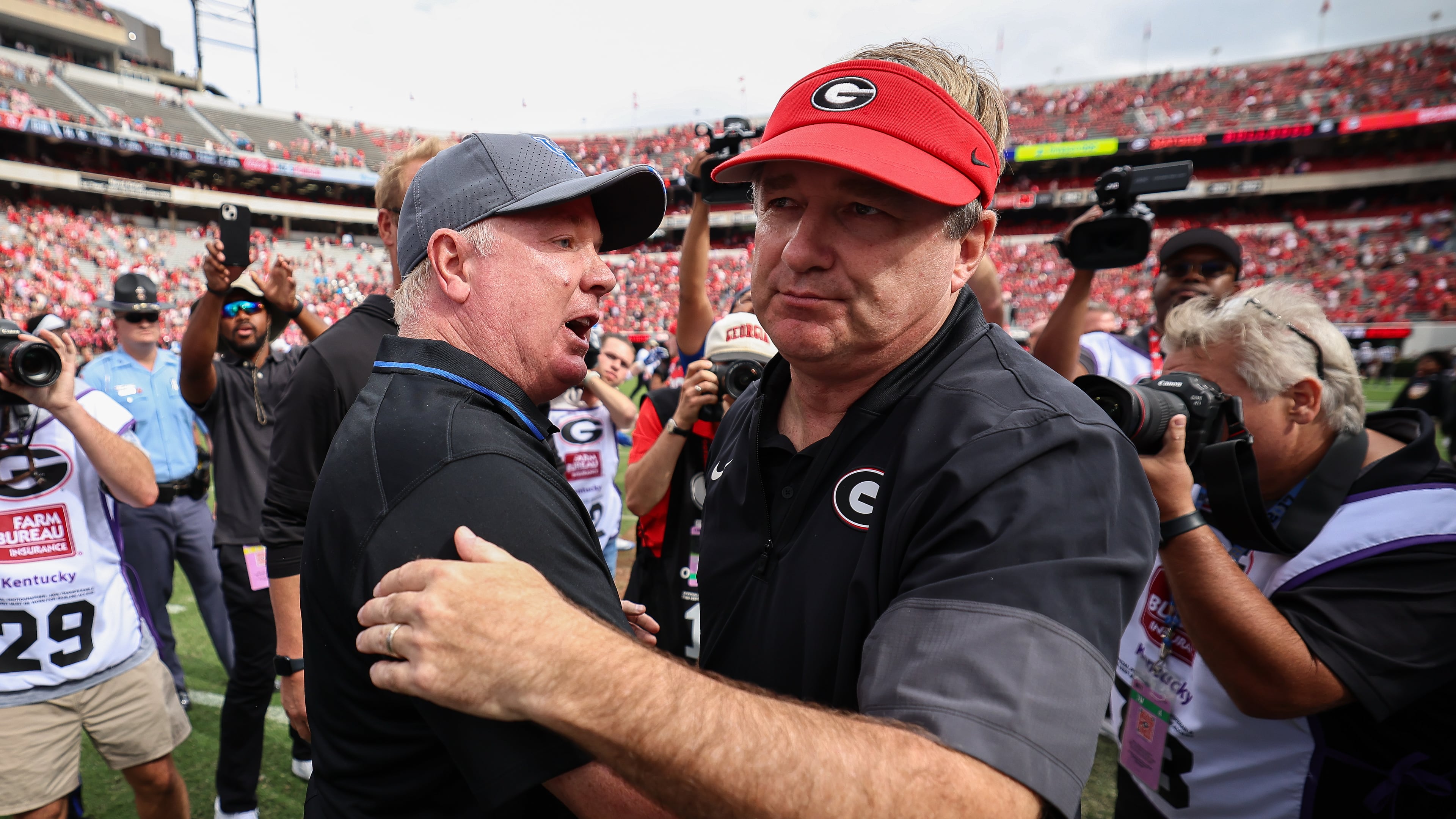 Kentucky's Mark Stoops is the longest-tenured head coach in the SEC and after his team's 35-14 loss to Georgia, he denied reports that he approached the school after last season about negotiating his buyout. (Colin Hubbard/AP)