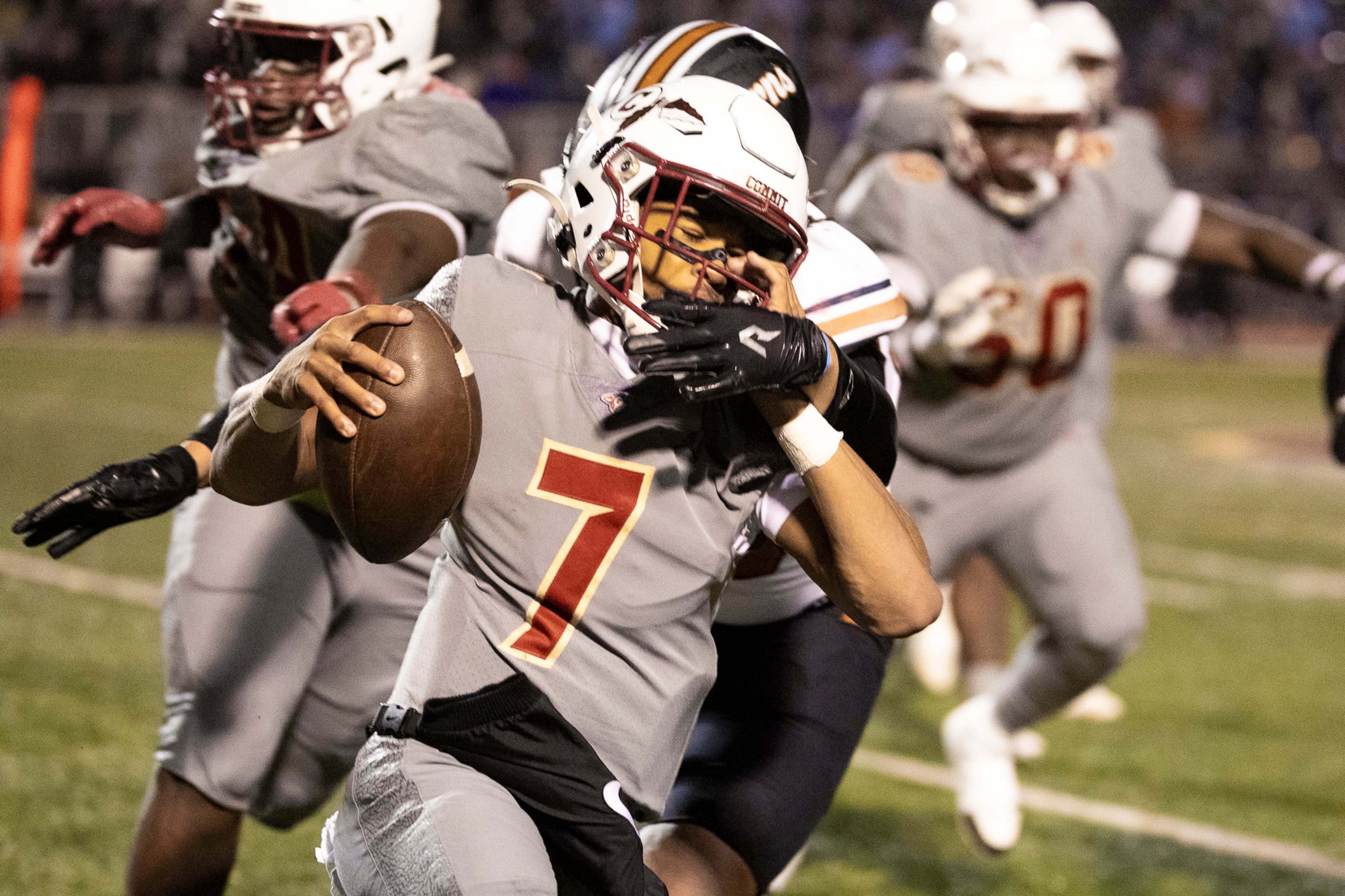 Creekside quarterback Cayden Benson (7) gets tackled during the first half of the class 4A semifinal against Kell at Creekside High School in Fairburn, GA on Friday, December 5, 2025. (Oscar Guevara Saenz for the AJC)