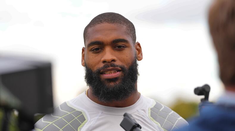 FILE - Denver Broncos' Jonathon Cooper speaks to the media at NFL football practice at Tottenham Hotspur training ground in London, Wednesday, Oct. 8, 2025. (AP Photo/Kirsty Wigglesworth, File)