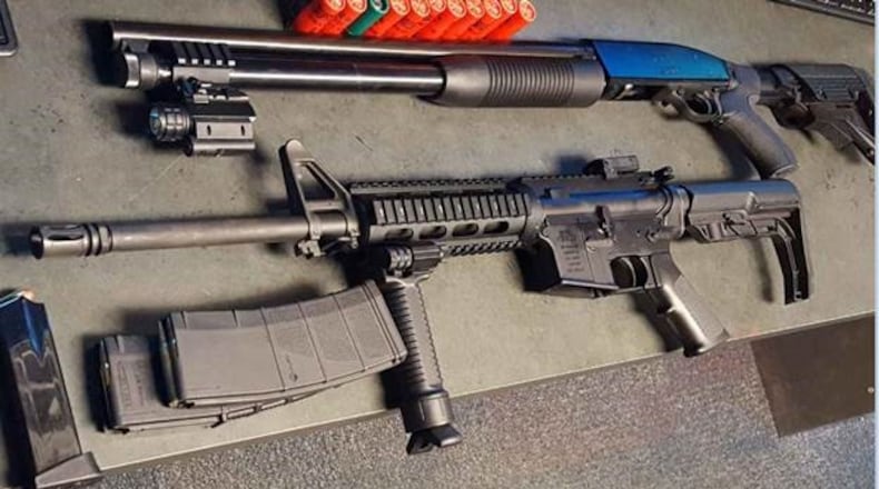 Gwinnett County police seized guns and drugs in a gang raid on March 28.