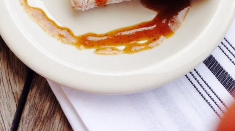 Watershed’s beignets are topped with sauce. (Green Olive Media)