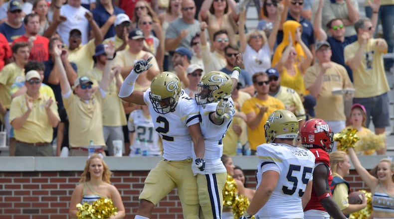 Georgia Tech wide receiver Ricky Jeune (2) and teammate TaQuon Marshall (16) celebrate after Jeune caught a touchdown pass in theTech home opener at Bobby Dodd Stadium on Saturday, September 9, 2017.  HYOSUB SHIN / HSHIN@AJC.COM
