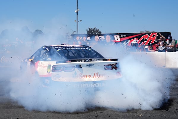 Shane van Gisbergen performs a burnout as he celebrates after winning a NASCAR Cup Series auto race at Sonoma Raceway, Sunday, July 13, 2025, in Sonoma, Calif. (AP Photo/Godofredo A. Vásquez)