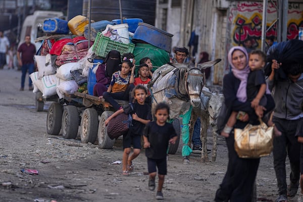 Displaced Palestinians flee Jabalia after the Israeli army issued evacuation orders in Gaza City, June 29, 2025. (AP Photo/Jehad Alshrafi)