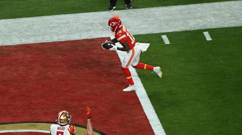 Kansas City Chiefs wide receiver Mecole Hardman (12) scores the winning touchdown in overtime during Super Bowl LVIII against the San Francisco 49ers at Allegiant Stadium in Las Vegas on Sunday, Feb. 11, 2024. The Chiefs won 25-22. (Bridget Bennett/The New York Times)