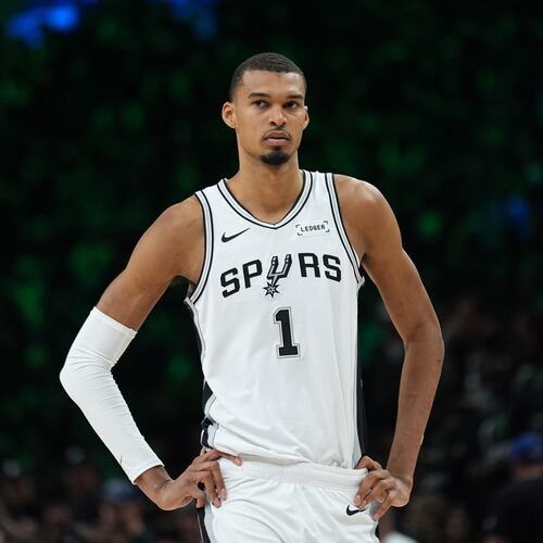 San Antonio Spurs forward Victor Wembanyama (1) waits for play to resume during the first half of Game 3 of a NBA basketball second-round playoff series against the Minnesota Timberwolves in Minneapolis, Friday, May 8, 2026. (AP Photo/Abbie Parr)