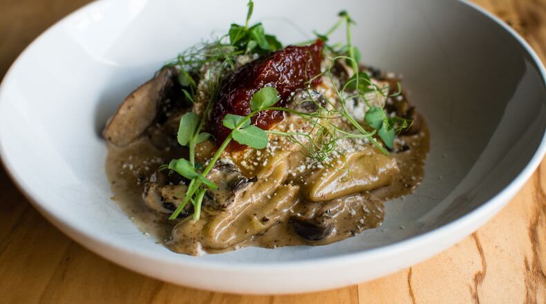 Silk handkerchief pasta with roasted wild mushrooms, porcini cream, tomato marmalade and cotija cheese at Better Half. / CONTRIBUTED BY HENRI HOLLIS