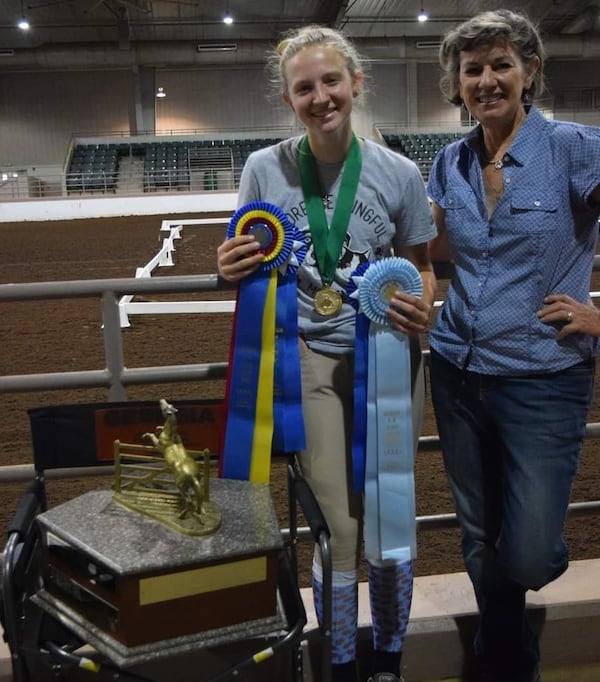 Emma Bayer of Powder Springs was the GA 4H State Equestrian Champion. She is shown here with Dr. Julia McCann-Snyder from UGA.