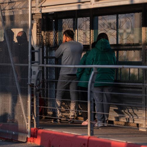 FILE - A group of undocumented migrants is deported by U.S. Immigration and Customs Enforcement agents across the McAllen–Hidalgo–Reynosa International Bridge in McAllen, Texas, March 13, 2026. (AP Photo/Felix Marquez, File)