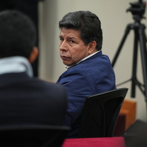 Former President Pedro Castillo, who faces charges of rebellion and other crimes against the state, attends his sentence hearing at a police base on the outskirts of Lima, Peru, Thursday, Nov. 27, 2025. (AP Photo/Guadalupe Pardo)