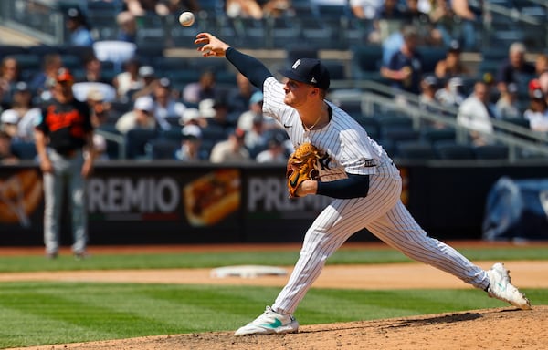 New York Yankees pitcher Clarke Schmidt throws during the seventh inning of a baseball game against the Baltimore Orioles, Saturday, June 21, 2025, in New York. (AP Photo/Noah K. Murray)