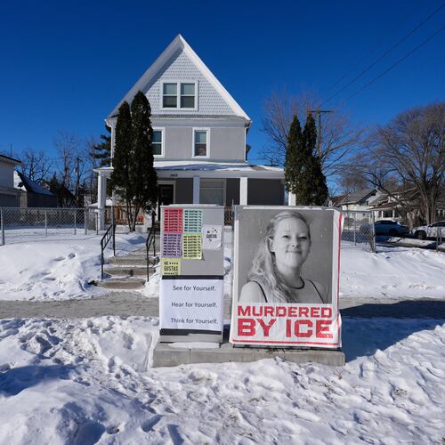 A photo of Renee Good is displayed in front of a home on Saturday, Jan. 31, 2026, in Minneapolis. (AP Photo/Alex Brandon)