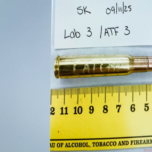 An image of a bullet casing engraved with the word "Catch!" is displayed during a preliminary hearing for Tyler Robinson, who is accused in the fatal shooting of Charlie Kirk, at the Fourth District Courthouse in Provo, Utah, Thursday, July 9, 2026. (AP Photo/Spenser Heaps, Pool)