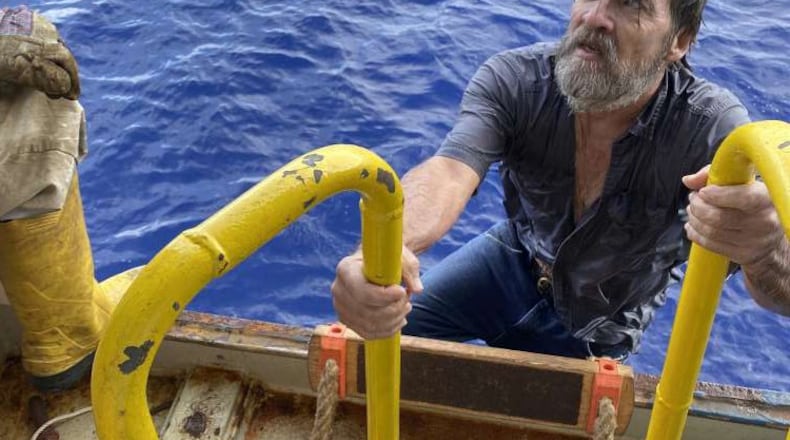 Florida boater Stuart Bee was in a precarious position in the Atlantic, according to photos of the incident, which showed the 32-foot Sea Ray vessel about to go underwater just as the crew pulled him to safety.