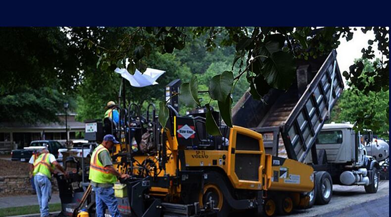 Cherokee County will have Bartow Paving Co. Inc. resurface 3.7 miles of Ball Ground Highway near Canton. AJC FILE