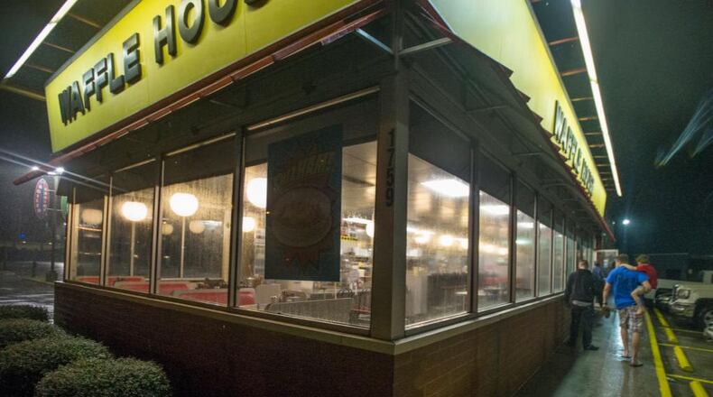 The family of a man killed at a Waffle House in Tennessee is suing the father of the accused shooter.