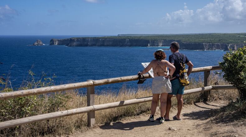 Happiness comes when you are moving toward your goals, and planning a vacation can be one of them. (Tony Cenicola/The New York Times)