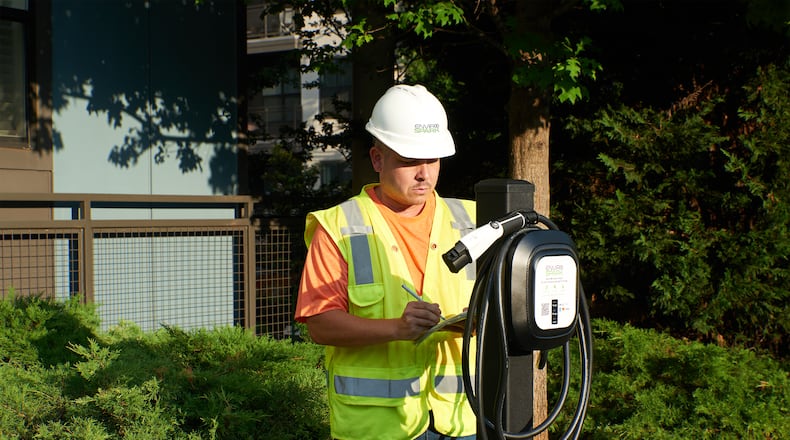 EnviroSpark worker installing electric charging station. Georgia Power, MARTA, California-based Charger Help, which maintains EV charging stations in Atlanta, and EnviroSpark, which installs and operates charging stations locally, intend to hire certified technicians who come through the Goodwill North Georgia program