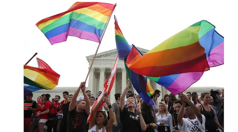 Same-sex marriage supporters rejoice after the U.S Supreme Court hands down a ruling regarding same-sex marriage June 26, 2015 outside the Supreme Court in Washington, D.C. The high court ruled that same-sex couples have the right to marry in all 50 states.