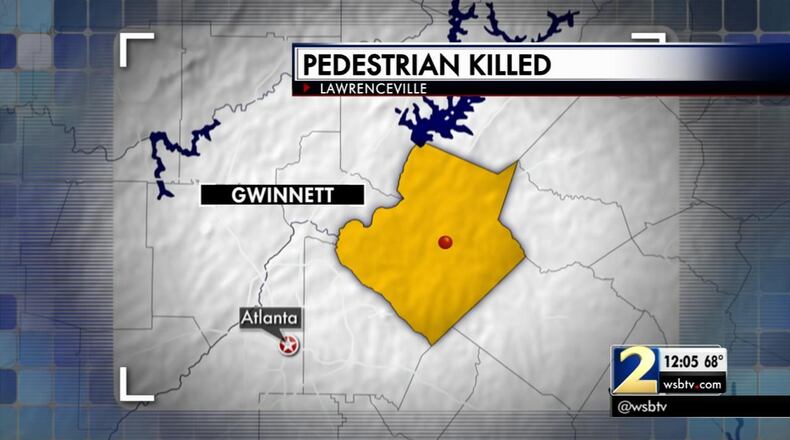 Gwinnett County police are trying to identify a man struck and killed by a car Saturday at Lawrenceville Highway south of Sugarloaf Parkway. (Credit: Channel 2 Action News)