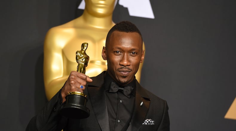 Mahershala Ali poses in the press room with the award for best actor in a supporting role for "Moonlight" at the Oscars on Sunday, Feb. 26, 2017, at the Dolby Theatre in Los Angeles. (Photo by Jordan Strauss/Invision/AP)