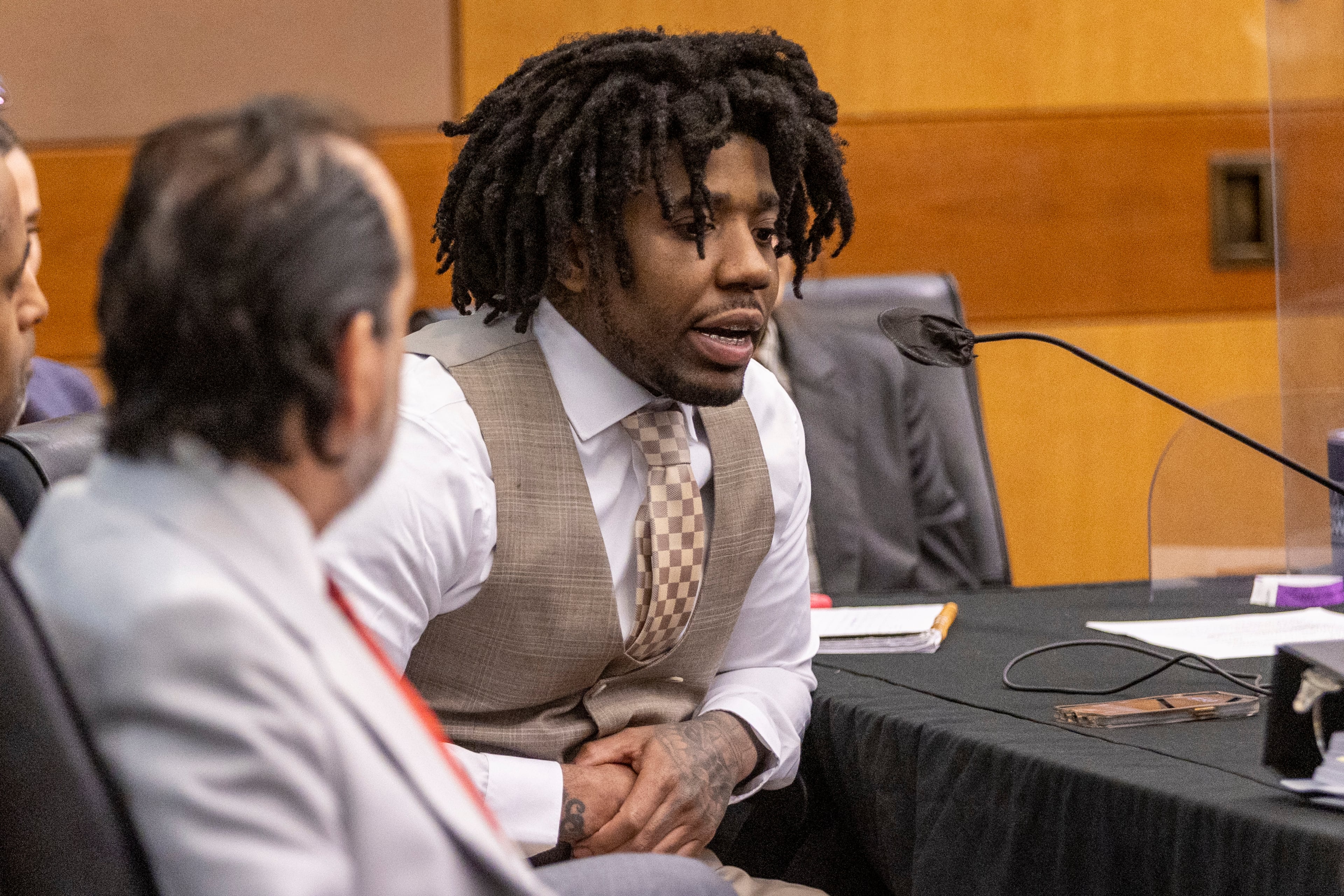 Atlanta rapper YFN Lucci, whose real name is Rayshawn Bennett, pleads guilty at the Fulton County Courthouse Courtroom on Tuesday, January. 23, 2024. Facing a life in prison without the possibility of parole, Bennett pleaded guilty to one count of violating the street gang and terrorism prevention act. (Steve Schaefer/AJC)