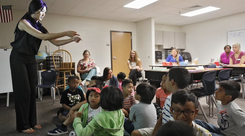 June 4, 2019 - Norcross - While Sophia Kim, 2nd Grade Cluster Trainer, teaches students, teachers (in rear) are observing her. Teachers participate in Gwinnett County’s Math Institute at Baldwin Elementary School in Norcross. Master teachers demonstrated instruction techniques in classroom situations with real students . Bob Andres / bandres@ajc.com