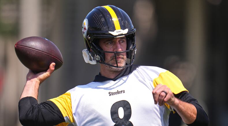 Pittsburgh Steelers quarterback Aaron Rodgers (8) participates in the football team's OTA workout in Pittsburgh, Monday, May 18, 2026. (AP Photo/Gene J. Puskar)
