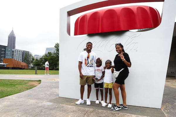 The Billups family from Columbia, S.C., made a visit to Atlanta's World of Coca-Cola on Saturday, July 19, 2025. Arielle Billups (right) says her family tries to stay away from products with high-fructose corn syrup. (Abbey Cutrer/AJC)