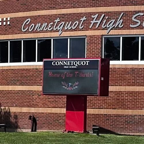 FILE - An electronic display shows the new mascot name, T-Birds, outside Connetquot High School in Bohemia, N.Y., Sept. 4, 2025. (AP Photo/Philip Marcelo, File)