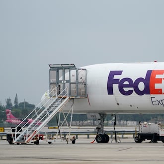 FILE - A FedEx cargo plane is shown on the tarmac at Fort Lauderdale-Hollywood International Airport, Tuesday, April 20, 2021, in Fort Lauderdale, Fla. (AP Photo/Wilfredo Lee, File)