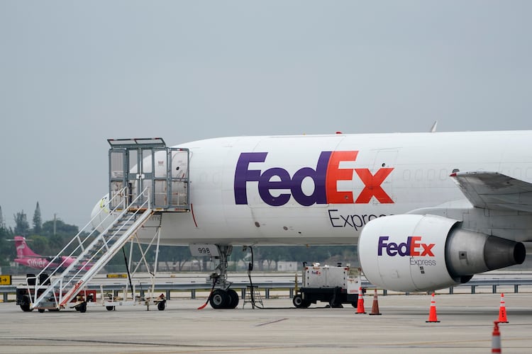 FILE - A FedEx cargo plane is shown on the tarmac at Fort Lauderdale-Hollywood International Airport, Tuesday, April 20, 2021, in Fort Lauderdale, Fla. (AP Photo/Wilfredo Lee, File)