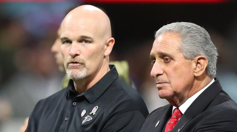 November 12, 2017 Atlanta : Falcons head coach Dan Quinn and owner Arthur Blank confer before playing the Cowboys in a NFL football game on Sunday, November 12, 2017, in Atlanta. Curtis Compton/ccompton@ajc.com