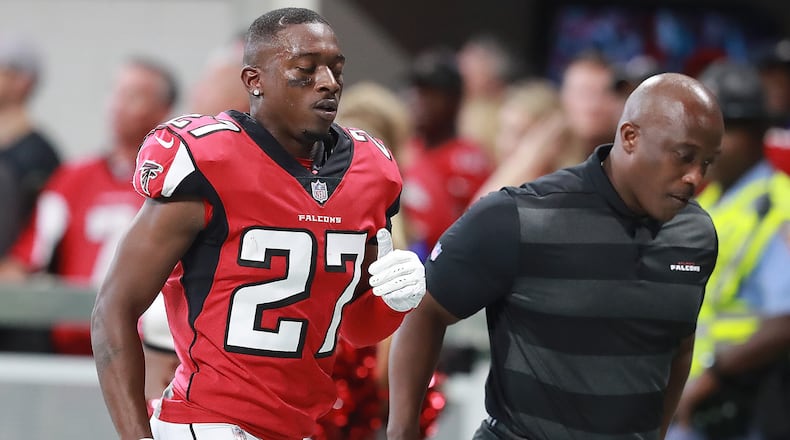 Falcons safety Damontae Kazee is ejected from the game on a hit against Panthers quarterback Cam Newton during the first half Sunday, Sept 16, 2018, at Mercedes-Benz Stadium in Atlanta.