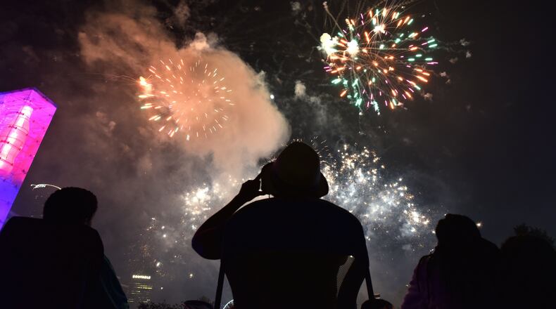 In 2017, fireworks lit up the downtown skyline during the July Fourth celebration. This year, the event returns to Centennial Olympic Park as Look Up Atlanta. HYOSUB SHIN / HSHIN@AJC.COM
